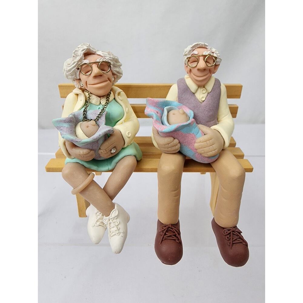 D Manning Shelf Sitters Retired Grandma & Grandpa Holding Babies On Wood Bench